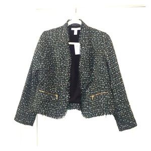 Super chic Chanel-looking jacket.